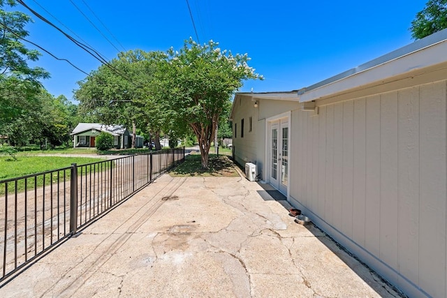 201 N Bowie Ave, Cameron, TX 76520 - view of property exterior featuring fence and a patio