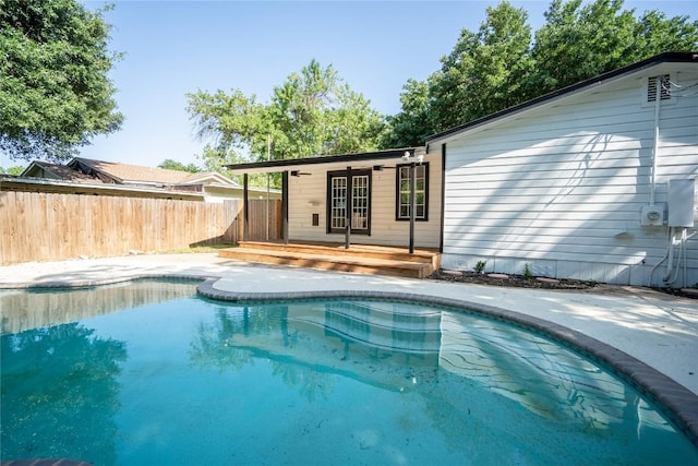 908 Kent St, Taylor, TX 76574 - view of pool with a wooden deck and a patio