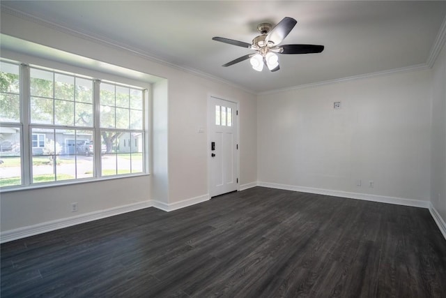 908 Kent St, Taylor, TX 76574 - entrance foyer featuring dark wood-style flooring, ceiling fan, and ornamental molding