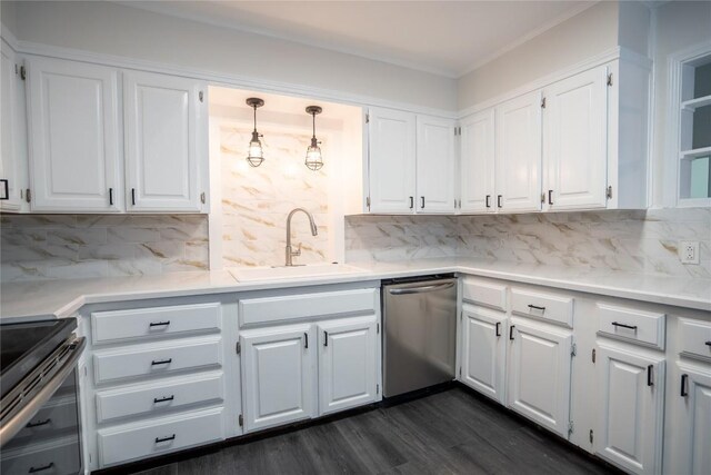 908 Kent St, Taylor, TX 76574 - kitchen featuring stainless steel appliances, backsplash, white cabinets, dark wood-style flooring, and light countertops