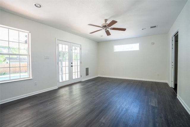 908 Kent St, Taylor, TX 76574 - empty room with dark wood-style flooring, ceiling fan, french doors, and recessed lighting
