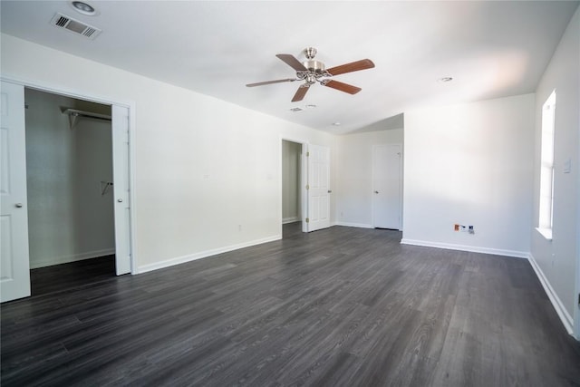 908 Kent St, Taylor, TX 76574 - empty room with dark wood-style flooring and ceiling fan