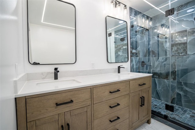 908 Kent St, Taylor, TX 76574 - bathroom with double vanity, a marble finish shower, and marble finish flooring