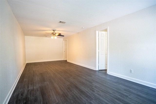 908 Kent St, Taylor, TX 76574 - unfurnished room with dark wood finished floors and ceiling fan