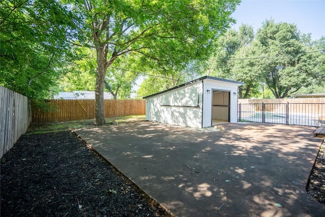 908 Kent St, Taylor, TX 76574 - fenced backyard with a patio and a shed