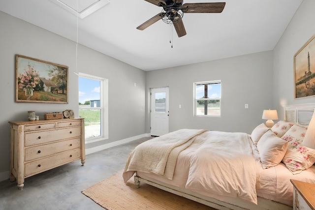12935 Prairie Cir Unit 3641, Kempner, TX 76539 - bedroom with attic access, ceiling fan, baseboards, and finished concrete floors