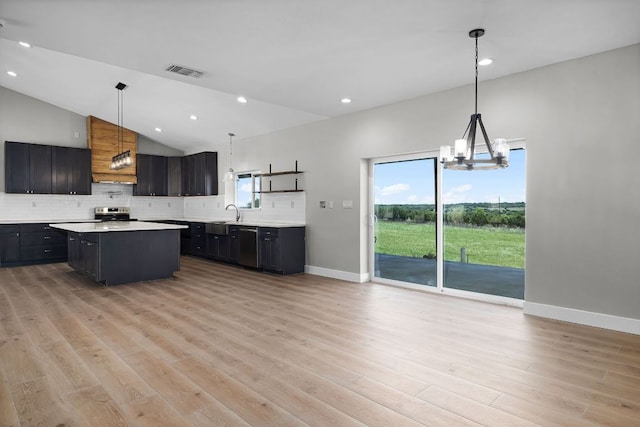 12935 Prairie Cir Unit 3641, Kempner, TX 76539 - kitchen featuring light countertops, a chandelier, tasteful backsplash, light wood-type flooring, and baseboards
