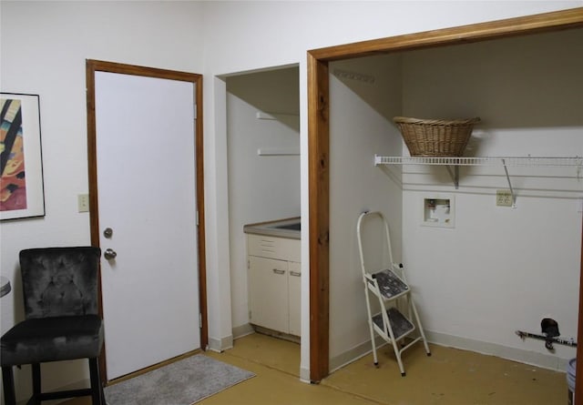 704 Marquis Ln, Cedar Park, TX 78613 - laundry room with hookup for a washing machine and baseboards