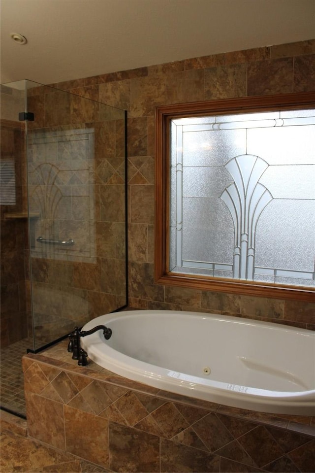 704 Marquis Ln, Cedar Park, TX 78613 - bathroom featuring a jetted tub and a tile shower