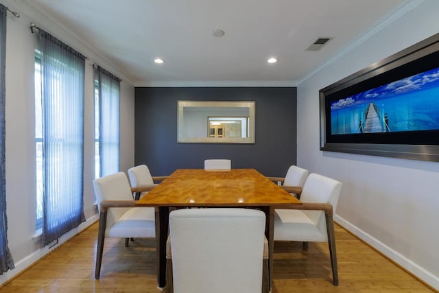 4902 Pony Chase, Austin, TX 78727 - dining room featuring ornamental molding, light wood-type flooring, and recessed lighting