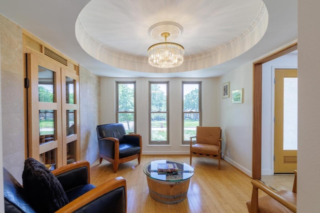 4902 Pony Chase, Austin, TX 78727 - living area featuring light wood-type flooring and a chandelier