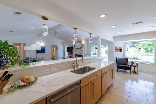 4902 Pony Chase, Austin, TX 78727 - kitchen with dishwasher, pendant lighting, light stone countertops, light tile patterned flooring, and recessed lighting
