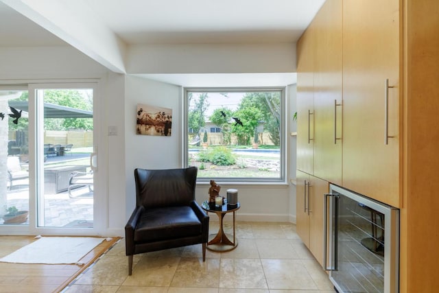 4902 Pony Chase, Austin, TX 78727 - living area with beverage cooler, healthy amount of natural light, and light tile patterned floors
