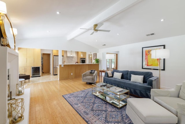 4902 Pony Chase, Austin, TX 78727 - living area featuring a ceiling fan, light wood-style floors, beverage cooler, and recessed lighting