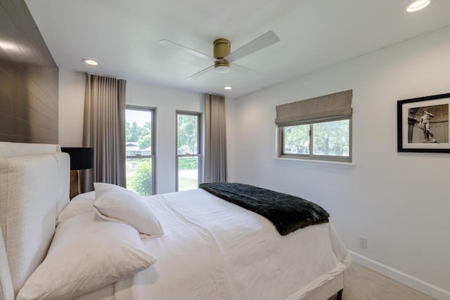 4902 Pony Chase, Austin, TX 78727 - carpeted bedroom with multiple windows, recessed lighting, and a ceiling fan