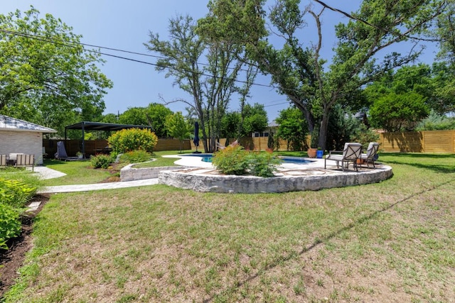 4902 Pony Chase, Austin, TX 78727 - fenced backyard featuring a patio