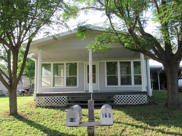 163 Cricket St, Tow, TX 78672 - rear view of house with covered porch and a yard