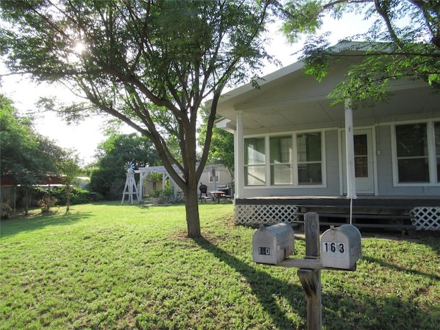 163 Cricket St, Tow, TX 78672 - view of grassy yard featuring a porch