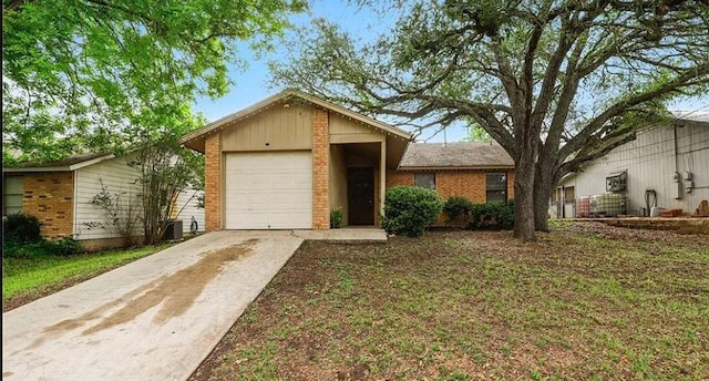 1919 Castle Gate Cir, San Marcos, TX 78666 - ranch-style house featuring an attached garage, driveway, and brick siding