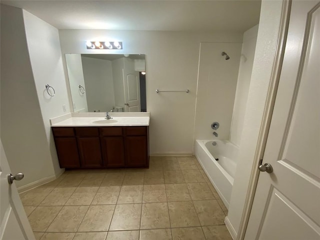 201 Sapphire Ln, Jarrell, TX 76537 - full bathroom featuring vanity, washtub / shower combination, tile patterned flooring, and baseboards