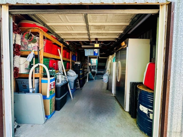 2355 County Road 130, Hutto, TX 78634 - garage featuring freestanding refrigerator