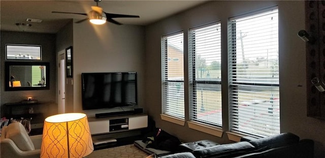 2020 Tripshaw Ln Unit 65C, Austin, TX 78741 - living area featuring healthy amount of natural light and ceiling fan