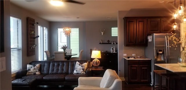 2020 Tripshaw Ln Unit 65C, Austin, TX 78741 - living room with a chandelier and ceiling fan