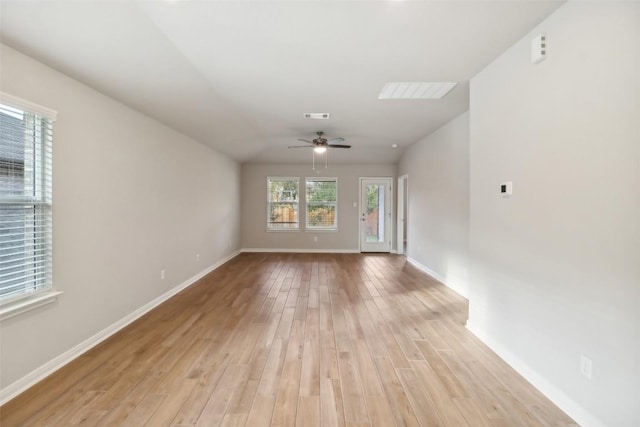 825 Sun Grove Trl, Georgetown, TX 78628 - unfurnished room featuring light wood-style flooring, a ceiling fan, and baseboards