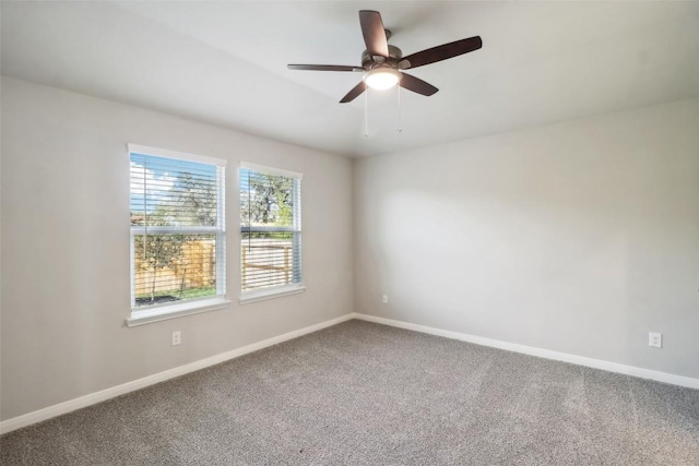 825 Sun Grove Trl, Georgetown, TX 78628 - empty room featuring carpet, baseboards, and a ceiling fan