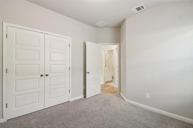 825 Sun Grove Trl, Georgetown, TX 78628 - unfurnished bedroom with carpet floors, a closet, and baseboards