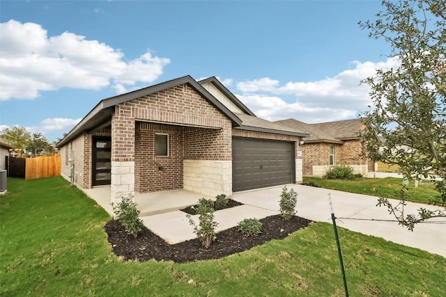 825 Sun Grove Trl, Georgetown, TX 78628 - view of front of house featuring brick siding, concrete driveway, an attached garage, and a shingled roof