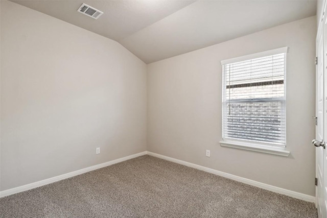 825 Sun Grove Trl, Georgetown, TX 78628 - carpeted spare room featuring vaulted ceiling and baseboards