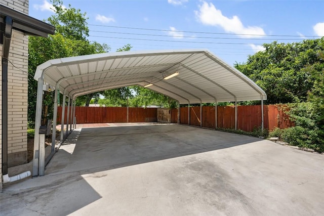 8500 Woodstone Dr, Austin, TX 78757 - view of car parking with a detached carport and driveway