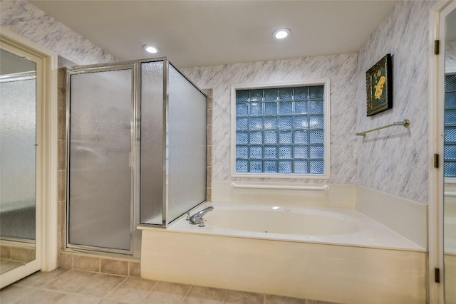 1310 Clayton Nolen, Horseshoe Bay, TX 78657 - full bath with a bath, a stall shower, tile patterned floors, and recessed lighting