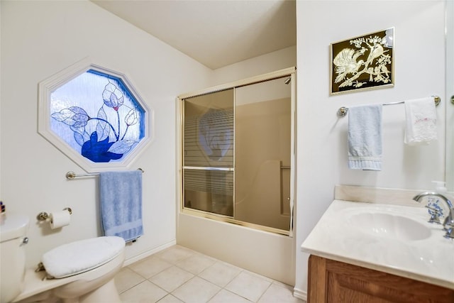 1310 Clayton Nolen, Horseshoe Bay, TX 78657 - bathroom with toilet, vanity, bath / shower combo with glass door, and tile patterned flooring