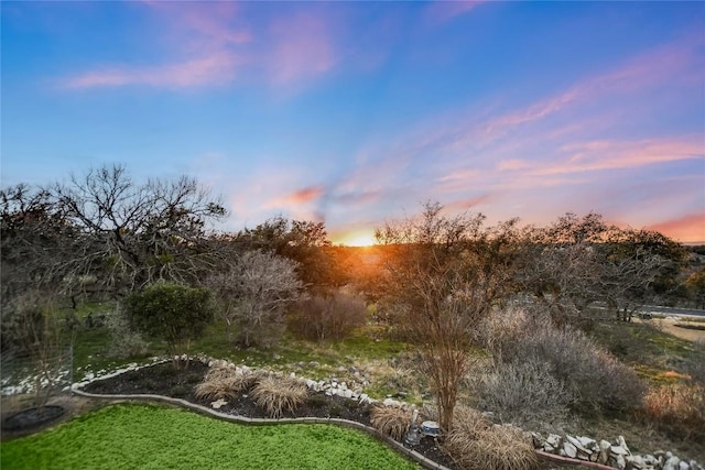1310 Clayton Nolen, Horseshoe Bay, TX 78657 - view of nature at dusk