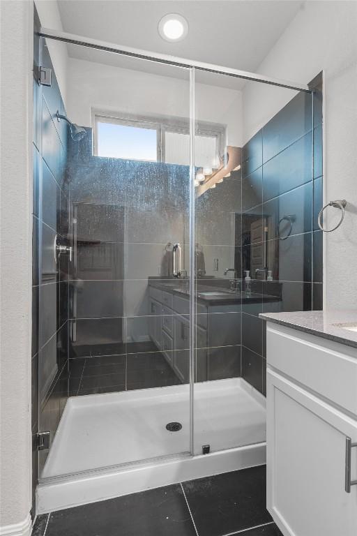 224 Backstays Loop, Kyle, TX 78640 - full bathroom with vanity and a stall shower