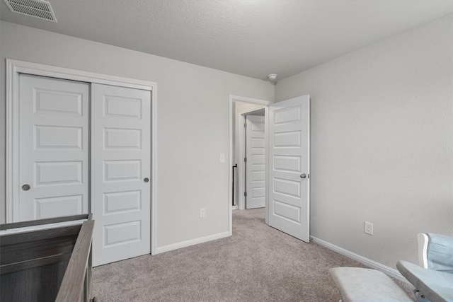 224 Backstays Loop, Kyle, TX 78640 - carpeted bedroom with baseboards and a closet