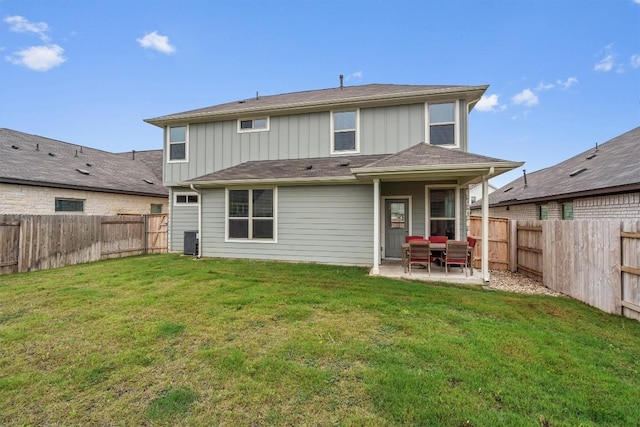 224 Backstays Loop, Kyle, TX 78640 - rear view of house with board and batten siding, a patio area, and central AC unit