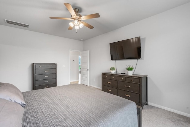 224 Backstays Loop, Kyle, TX 78640 - bedroom with baseboards, light carpet, and ceiling fan