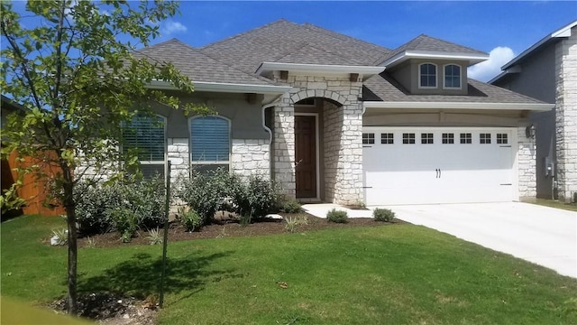 5301 Ponte Tresa Dr, Bee Cave, TX 78738 - french country style house with stone siding, concrete driveway, a front yard, and a garage