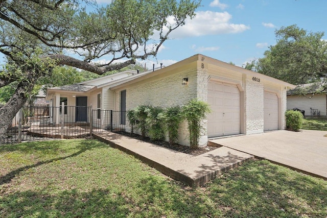 view of property exterior with driveway