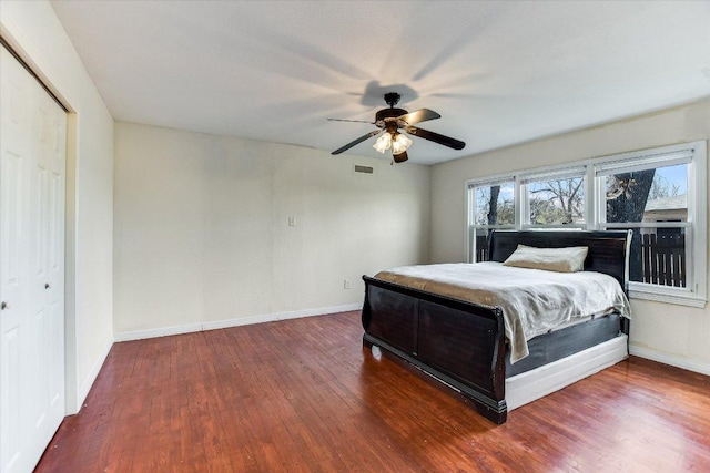 1312 N 8th St, Temple, TX 76501 - bedroom featuring baseboards, wood finished floors, and a ceiling fan