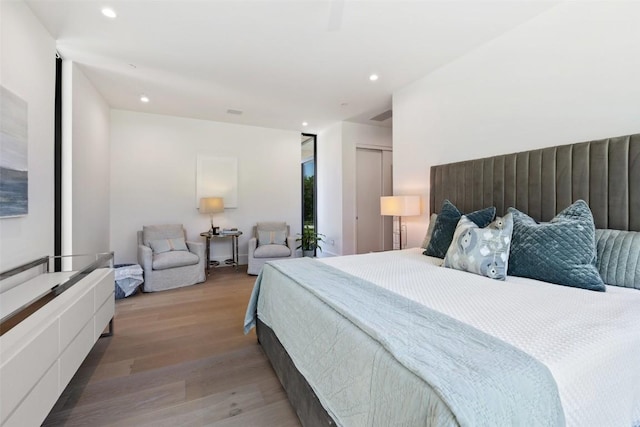 1604 Barclay Dr, Austin, TX 78746 - bedroom featuring light wood-style flooring and recessed lighting