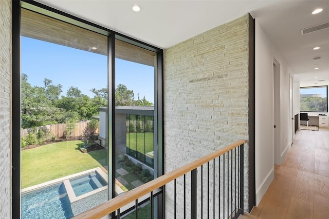 1604 Barclay Dr, Austin, TX 78746 - corridor with wood-type flooring and recessed lighting