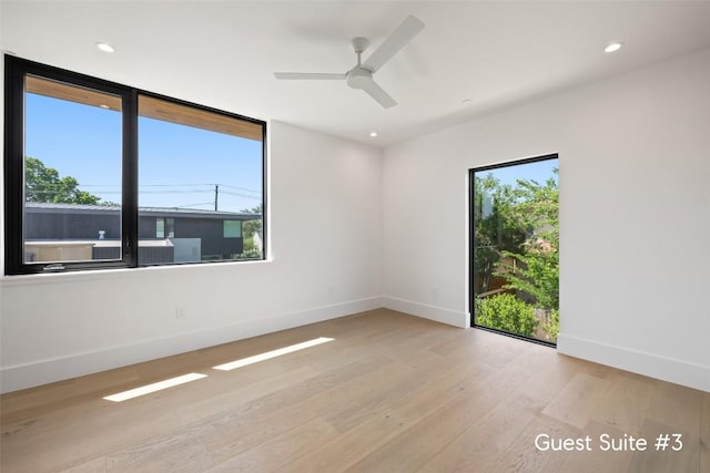 1604 Barclay Dr, Austin, TX 78746 - unfurnished room with plenty of natural light, light wood-style floors, ceiling fan, and recessed lighting