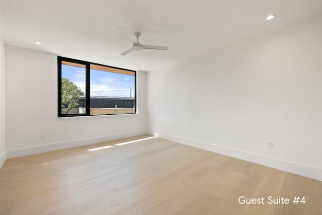 1604 Barclay Dr, Austin, TX 78746 - empty room with light wood-type flooring, a ceiling fan, baseboards, and recessed lighting