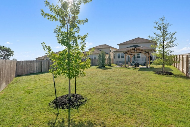 1116 View Dr, Georgetown, TX 78628 - fenced backyard with a gazebo and a patio