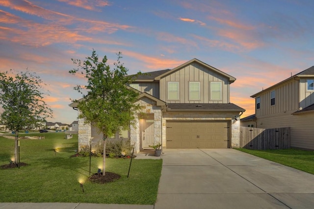 1116 View Dr, Georgetown, TX 78628 - view of front of home with board and batten siding, stone siding, an attached garage, and driveway