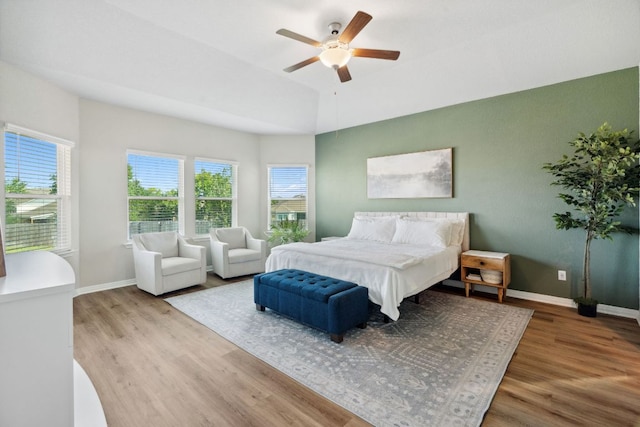1116 View Dr, Georgetown, TX 78628 - bedroom with multiple windows, wood finished floors, and ceiling fan
